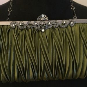 Green satin clutch